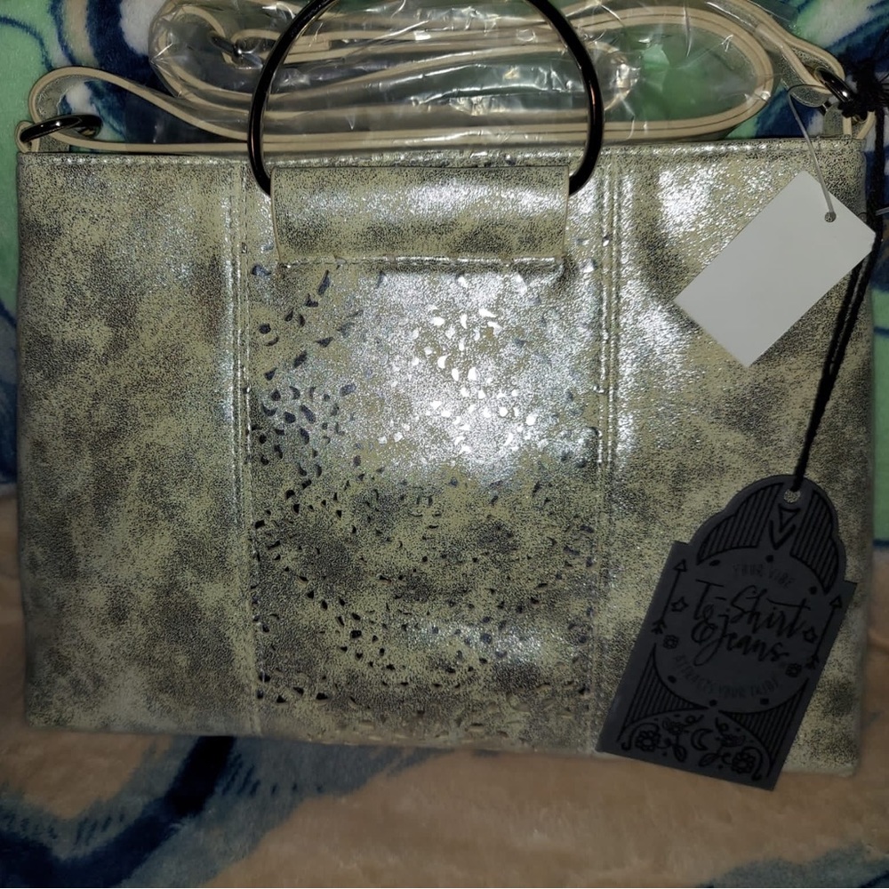 Beautiful white and silver women’s hand bag from tshirt and jeans